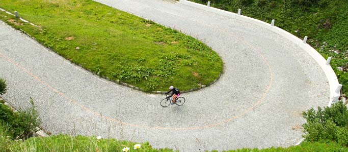 Brevet's challenging cycling holidays include the Granfondo Gottardo which features the highest cobbled road in Europe | Brevet Alpine Cycling Adventures