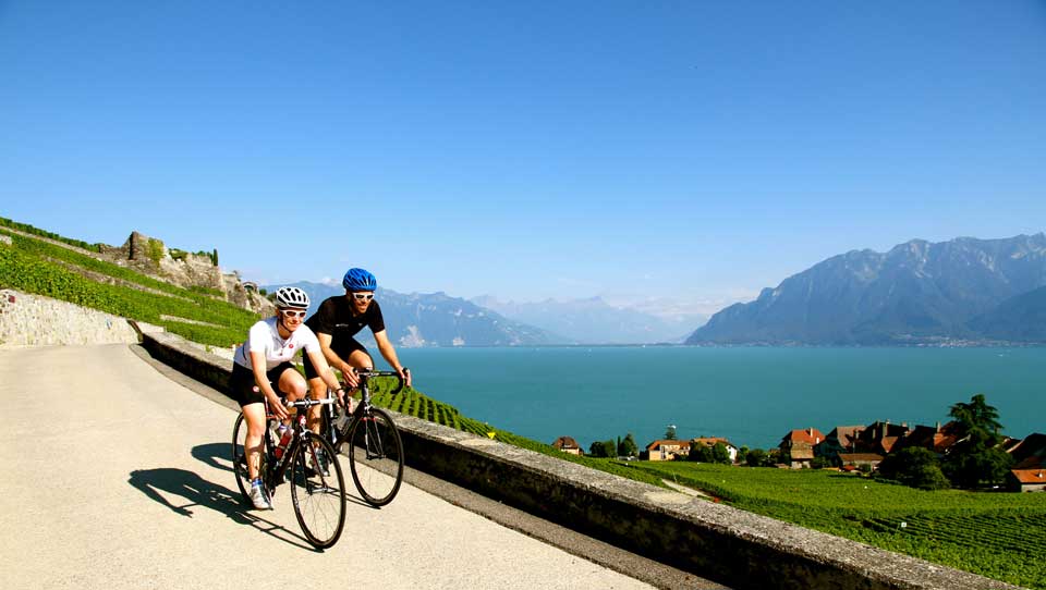 Hannah in the Lavaux: Cycling in the Alps is challenging but with our unique professional cycling support you can surpass your expectations on a Brevet cycling holiday